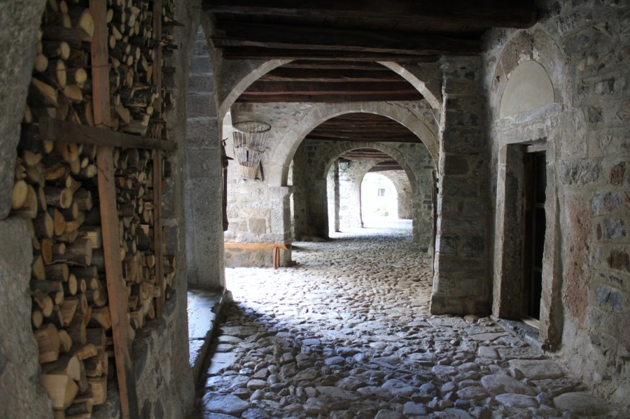 MEDIEVAL STREET WITH PORTICOS IN CORNELLO DEI TASSO (ITALY); PHOTO BY ROBERTO ALBORGHETTI